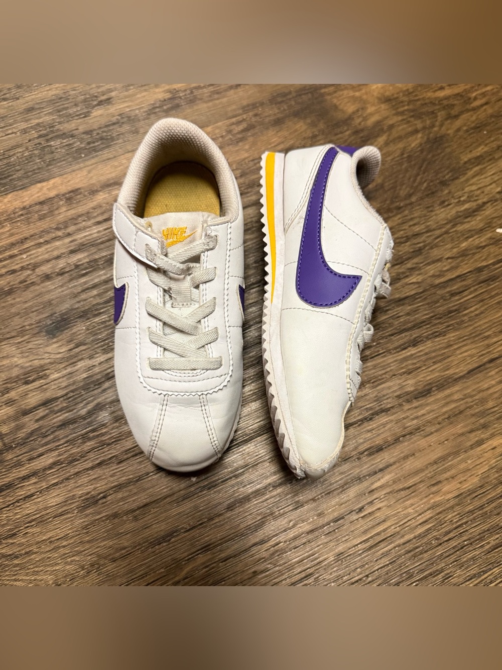 Nike Kids White Sneakers with Purple Swoosh and Yellow Heel Accent Size 11C